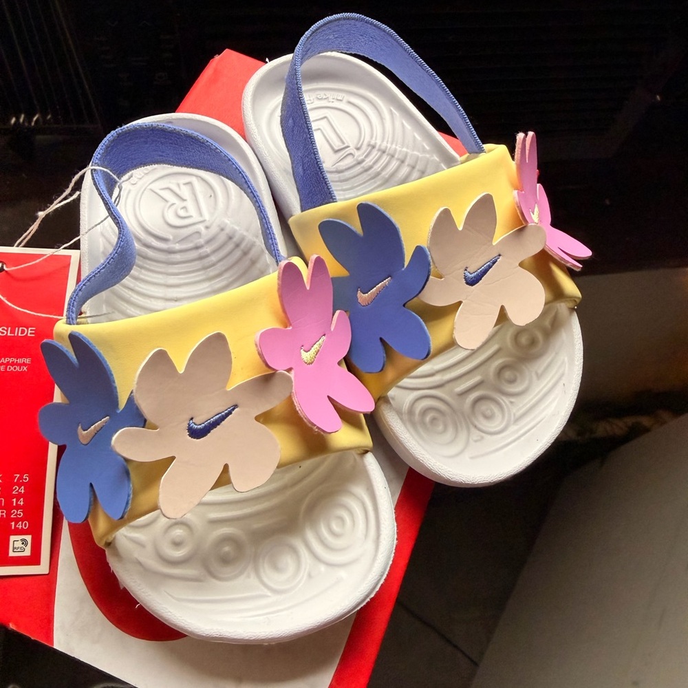 Nike Kids Yellow Slides with Pink Blue and Beige Flower Accents